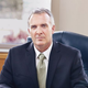 Multimillionaire business leader David Gilford says he owes all of his wealth and business success to his early days undergoing mitotic division.